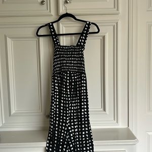 Ingrid & Isabel black and white jumpsuit. Smocked top with pockets